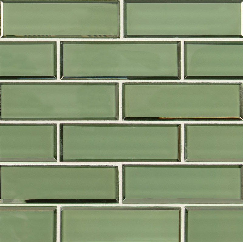 A close-up of a wall covered with glossy, rectangular green tiles arranged in a horizontal brick pattern with white grout lines, perfect for a stylish kitchen remodel. A close-up of a wall covered with glossy, rectangular green tiles arranged in a horizontal brick pattern with white grout lines, perfect for a stylish kitchen remodel.