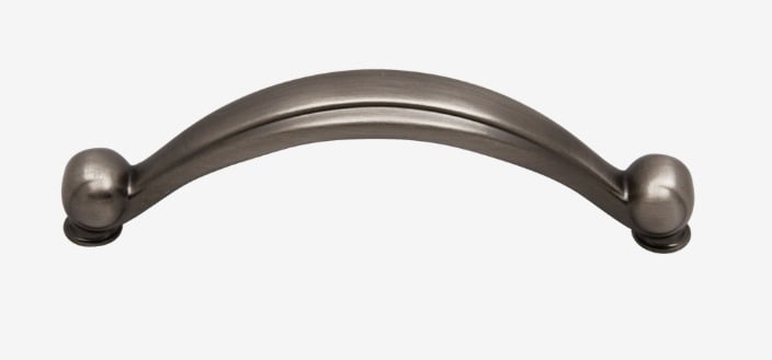 A brushed nickel cabinet handle with spherical ends. The handle has a smooth curved design.